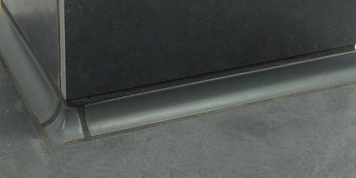 Cove Solutions glazed ceramic cove base | by Lexco Tile and Stone.